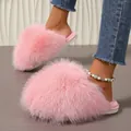 Soft pink fluffy faux fur slippers for women with cozy closed-toe design. - 36-37 / Pink