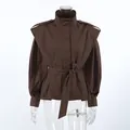 Front view of brown belted trench coat with puff sleeves and stand collar - S / Tops / Dark Brown