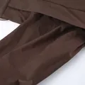 Close-up detail showing the texture and layered flap design of this dark brown trench coat - S / Tops / Dark Brown