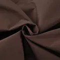 Close-up of premium chocolate brown trench coat fabric displaying elegant texture and drape - S / Tops / Dark Brown