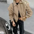 Khakifarbene Damen-Windjacke im französischen Stil mit Reverskragen und lockerem Schnitt - S / Oberteile / Khaki