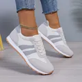 Detailed side view of lightweight breathable women's casual sneakers with gray stripes - 36 / Light Gray