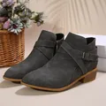 Elegant dark grey pointed-toe Chelsea boots featuring cross straps and a side zipper - Gray