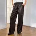 Elegante dunkelbraune matte Kunstleder-Hose mit hohem Bund und weitem Bein Damen - S / Unterteile / Braun
