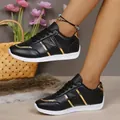 Stylish black faux-leather sneakers for women with elegant gold metallic accents and white soles - 36 / Black