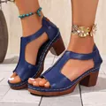 Close-up of stylish blue leather fish-mouth sandals with T-strap and high block heels - 36 / Blue