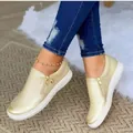 Comfortable women's casual champagne gold metallic flat shoes with side zipper detail - Gold