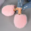 Detailed view of soft pink fluffy house slippers featuring high-density faux fur texture - 36-37 / Pink