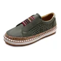 Close-up of green perforated slip-on loafers featuring a stylish striped elastic band detail - Green