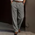Close-up of grey corduroy texture and loose straight-leg fit on these men's trousers - S / Bottoms / Gray