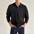 Vista frontal de un polo de hombre negro de manga larga con un elegante detalle de cremallera plata. - S / Tops / Negro