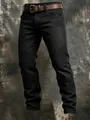 Detailed view of black cotton tactical cargo pants featuring pleated knee panels. - S / Bottoms / Black