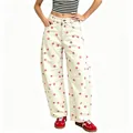 Detail of white wide-leg jeans with pink polka dots and curved silhouette design - 2XL / Bottoms / Pink