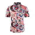 Detail view of men's 70s retro disco shirt with vibrant colorful paisley print - 3XL / Top And Bottom / Apricot Print