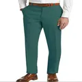 Detailed view of stylish men's green linen trousers with brown belt and leather shoes - Dark Green