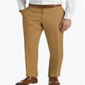 Detailed front view of men's camel linen trousers with brown leather belt and shoes - Turmeric