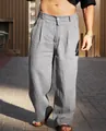 Detailed view of men's grey linen wide-leg trousers with breathable pleated texture - Gray
