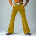 Stylish men's mustard gold velvet slim fit flare trousers with a retro aesthetic - Yellow