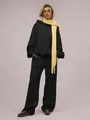 Modern woman in black oversized hoodie and wide-leg pants set with yellow scarf - S / Top And Bottom / Black