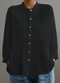 Vista dettagliata della camicetta plissettata nera a maniche lunghe da donna con pieghe - XS / Top / Nero