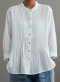 Dettaglio frontale camicia bianca a maniche lunghe con pieghe e bottoni - XS / Top / Bianco