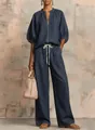 Κομψό γυναικείο σετ denim δύο τεμαχίων με τοπ με φερμουάρ και φαρδύ παντελόνι - Ναυτικό μπλε