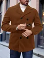 Detail view of brown wool coat showing double-breasted buttons and classic notched lapel - Brown