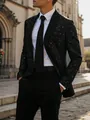 Gedetailleerd overzicht van een stijlvolle glanzende zwarte herenblazer voor feesten - S / Tops / Zwart