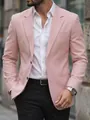 Gedetailleerde weergave van een roze herenblazer voor moderne zakelijke settings - S / Tops / Roze