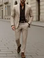 Full body view of a khaki men's business suit set in an outdoor urban street setting - S / Top And Bottom / Khaki