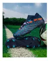 Professional soccer cleats with flyweave upper and molded studs on green grass. - 35 / Deep Blue Orange Long Spikes