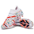 Detailed view of white soccer cleats featuring vibrant graffiti patterns and durable orange studs - 35 / Spike Style / White Orange Cleats