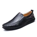 Side view of men's black leather loafers with hand-stitched toe and soft moccasin texture - 37 / Black