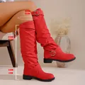 Women's red suede over-the-knee boots with chunky low heel and silver buckle detail - Red