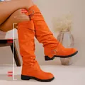 Vibrant orange suede over-the-knee slouchy boots with chunky heel and buckle details - Orange Red