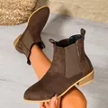 Stylish brown suede Chelsea boots for women featuring a pointed toe and side elastic panel - Brown