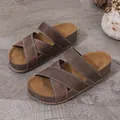 Detailed view of brown platform sandals with cross straps and white stitching. - 36 / Retro Cross Strap Slides (558) / Coffee