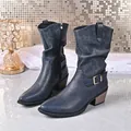 Detail view of blue mid-calf leather boots featuring side zipper and chunky wood-grain heel - 38 / Navy Blue