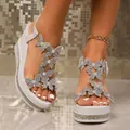 White wedge sandals with rhinestone platform and butterfly pearl appliques. - 35 / White