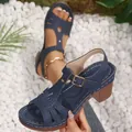 Stylish navy blue peep-toe sandals with chunky heels and elegant white stitching details - Blue