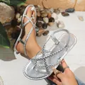 Elegant silver braided flat thong sandals for women's summer beach and casual vacation wear. - 36 / Silver