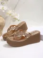 Rose gold platform wedge sandals with glitter straps and woven sole texture detail. - 35 / Rose Gold