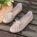 Beige perforated ballet flats with bow and rhinestone detail for women - 35 / Off White