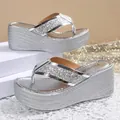 Elegant silver platform wedge flip-flop sandals with shimmering glitter straps for women - 35 / Silver