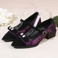 Detailed view of purple lace Mary Jane shoes with block heel and rhinestone bow details - 35 / Purple