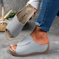 Close-up of grey peep-toe wedge sandals showing thick sole and side detail - 36 / Gray