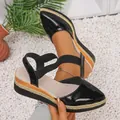Elegant black patent leather wedge sandals featuring rope platform and elastic strap - 36 / Wedge Sandals / Black