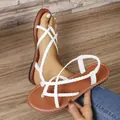 Stylish women's white braided thong sandals with durable comfortable brown flat soles - 36 / White