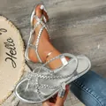 Stylish silver braided flat thong sandals with metallic finish perfect for beach wear - 36 / Silver