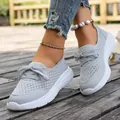 Close-up of grey breathable mesh slip-on sneakers for women on a rustic wooden deck. - 36 / Gray